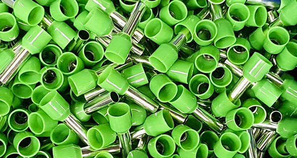 Close-up of green bootlace 6mm ferrules in tool box.