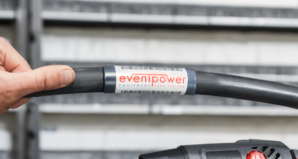 Eventpower Equipment branded logo attached to cable with glue lined clear adhesive heat shrink.