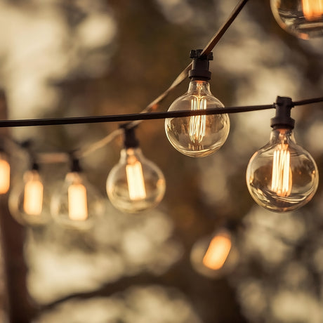 commercial festoon lighting at night outdoors.